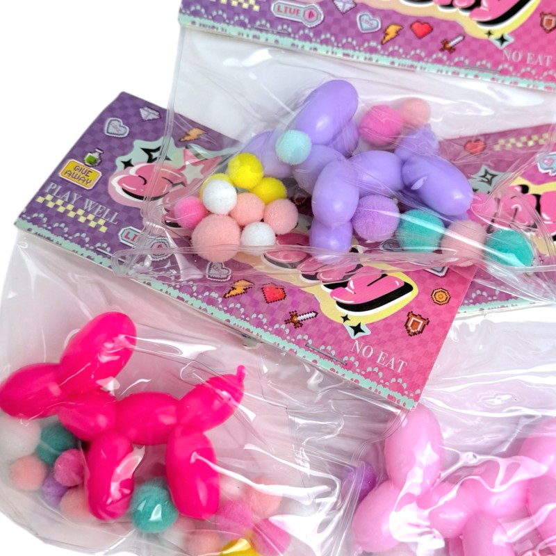 Gniotek Taba piesek balonik z pomponikami 7x6cm