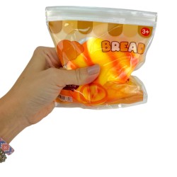 Gniotek squishy rogalik maślany chlebek 12 cm 1 szt.